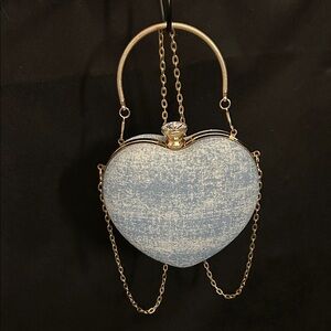 Elegant White Heart-Shaped Bag with Gold Accents